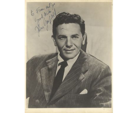 GARFIELD JOHN: (1913-1952) American Actor. Vintage signed and inscribed 8 x 10 photograph of the actor seated in a head and s