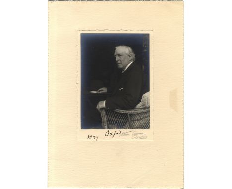 ASQUITH H. H.: (1852-1928) British Prime Minister 1908-16. A fine vintage signed 4.5 x 6.5 photograph of Asquith seated in a 