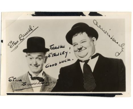 LAUREL STAN: (1890-1965) English Film Comedian. Vintage signed and inscribed postcard photograph, the image depicting Laurel 