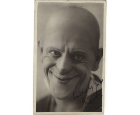 GROCK: (1880-1959) Swiss Clown. Vintage signed postcard photograph, a close-up smiling portrait of the king of clowns in his 