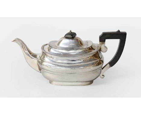 A George V Silver Teapot, by Ackroyd Rhodes, London, 1913, in the George III style, oblong and with gadrooned border, with eb