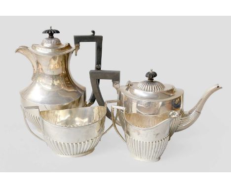 A Four-Piece George V Silver Tea-Service, The Teapot by William Devenport, Birmingham, 1914; The Hot-Water Jug by Joseph Glos