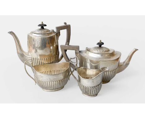 A Four-Piece George V Silver Tea and Coffee-Service, by Thomas Levesley, Sheffield, 1918, each piece tapering oval and with f