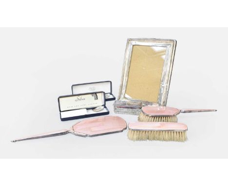 A Collection of Assorted Silver, including a three-piece dressing-table service, enamelled in pink on an engine-turned ground