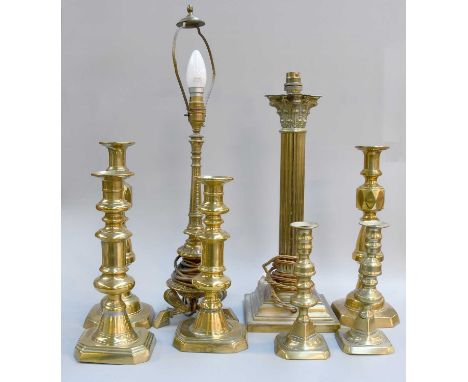 Three Pairs of Victorian Brass Candlesticks, a brass Corinthean column lamp and a further table lamp (one tray)