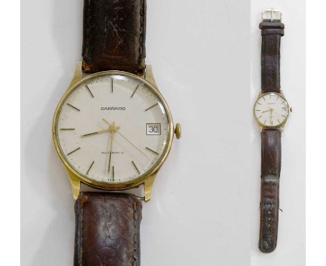 A 9 Carat Gold Automatic Calendar Centre Seconds Garrard WristwatchThe case with surface scratches. Case dirty in parts. Late