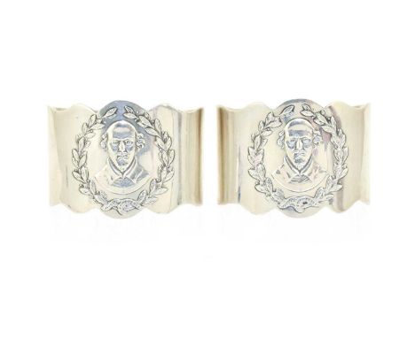 A Pair of Edward VII Silver Napkin-Rings, by S. Glass, Birmingham, 1903, each shaped oval, the front stamped with a portrait 