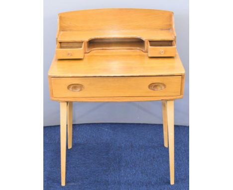 Ercol 1960s / mid century modern light elm desk model 437, with raised fitted drawers, cubby hole and shelf over a single str