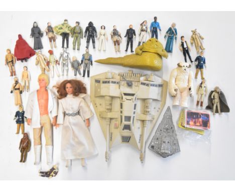 Thirty vintage Kenner Star Wars action figures to include Luke Skywalker (Hoth), Chewbacca, Princess Leia, Ugnaught, Lando Ca