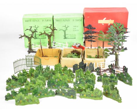 A collection of Britains Farm metal scenery pieces to include Tree &amp; Gate 7F and New Model Tree 58F, some in original box