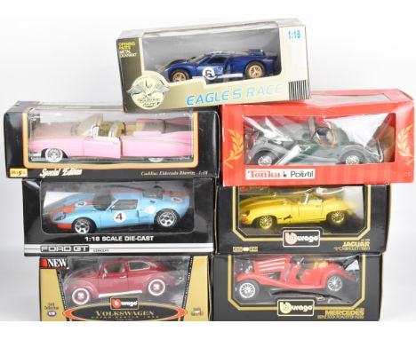 Seven 1:18 scale diecast model sports cars by Burago, Maisto and similar to include Ford GT, Mercedes Benz 500K and Jaguar E 