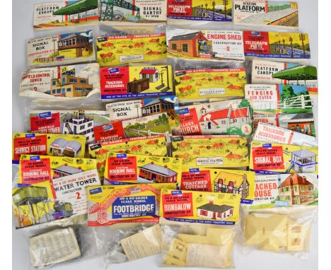 Thirty early Airfix H0/00 scale plastic model railway kits including platforms, signal box, telegraph poles, booking hall, wa