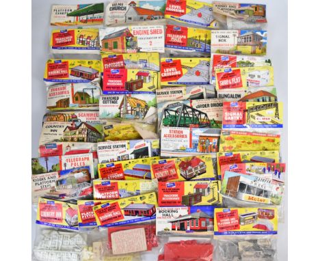 Forty early Airfix H0/00 scale plastic model railway kits including platforms, signal box, telegraph poles, booking hall, wat