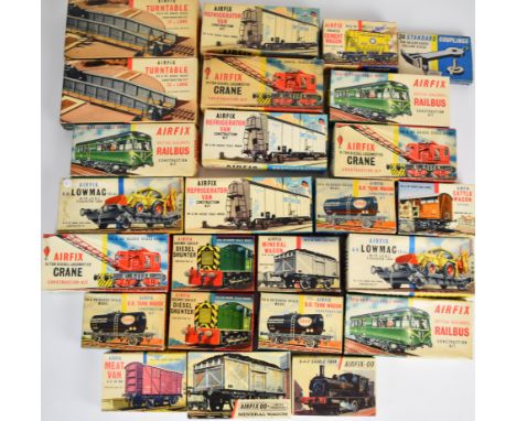Twenty-two early Airfix H0/00 scale plastic model railway kits including locomotives, rolling stock and accessories, all in o