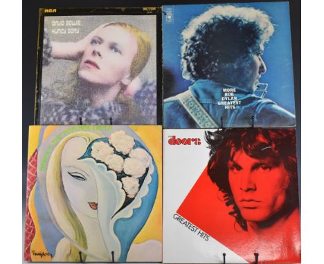 Sixty five mainly Rock, Prog Rock and Heavy Rock LPs including Derek And The Dominoes Layla, The Doors, More Bob Dylan Greate