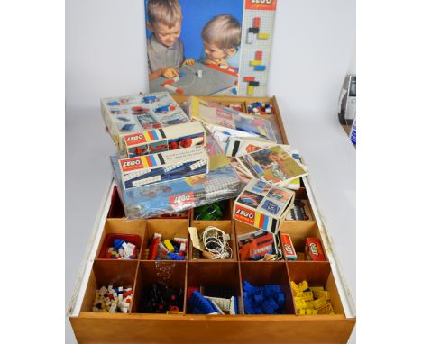 Two vintage Lego Systems building sets, both in original wooden boxes, together with seven accessory kits, base plate and ins