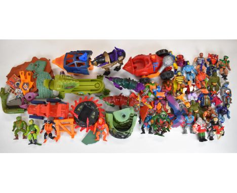 A collection of He-Man and the Masters of the Universe (MOTU) figures and vehicles by Mattel to include Skeletor, Leech, Moss