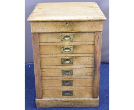 London and North Western Railway Co 19thC pine ticket office Wellington chest of seven straight drawers with brass campaign h
