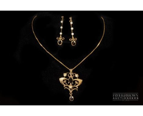 A 9ct gold garnet and cultured pearl pendant; and a pair of 9ct gold cultured pearl and garnet earrings, total weight approxi