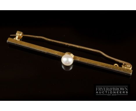An antique natural pearl platinum and gold bar brooch
