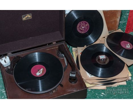 A vintage record player, together with a small quantity of 78-records (qty)
