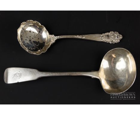 A silver sauce ladle, makers mark William Law, Dublin 1812, 48grs approx; and a silver sifter spoon, Sheffield 1905, 42grs (2