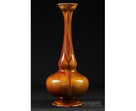 A Royal Worcester/Sabrina ware leadless glaze vase, of rose water sprinkler form, glazed in orange/red, printed mark, 28.5cm
