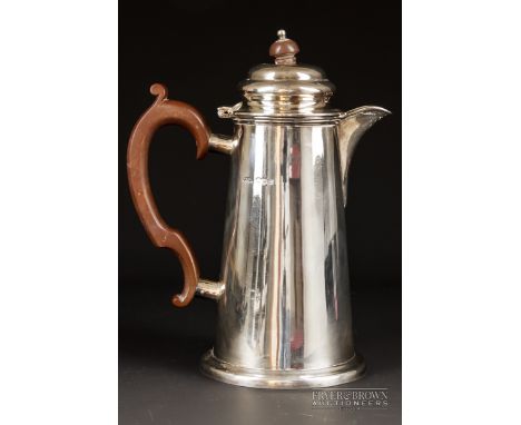 A silver coffee pot with hinged lid, melamine handle and knop, makers mark M &amp; Co., Sheffield 1929, 592grs total weight a