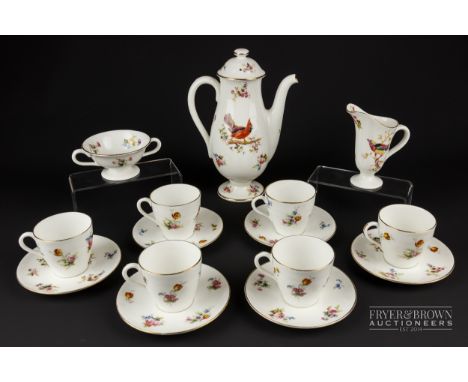 A Royal Doulton coffee service, H1422, printed in colours with birds, date stamped for November 1925, comprising six cups & s