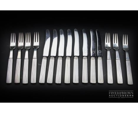 A vintage set of Art Deco silver fruit knives and forks by Georg Jenson, c1945, Sigfred Bernadotte pattern, each knife and fo
