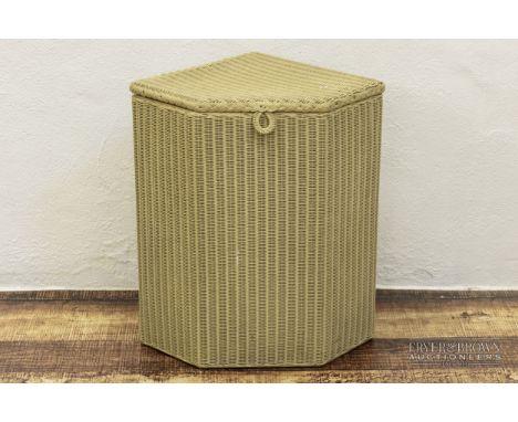 A vintage Lloyd Loom Lusty corner laundry basket, pale cream colouration, 54cm high