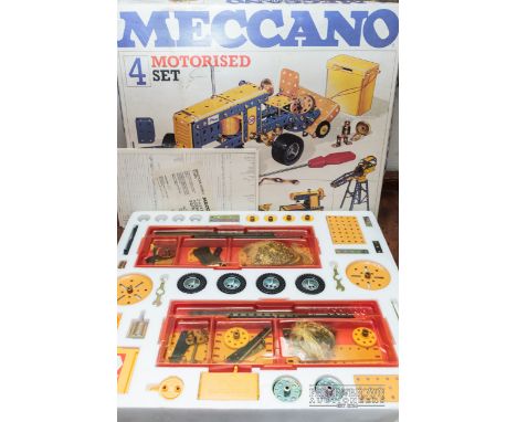 A Meccano motorised construction set, no. 4, boxed with instruction manual, 1978