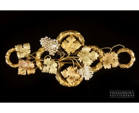 An early 19th century three coloured gold and seed natural pearl grapevine brooch of large size, finely worked