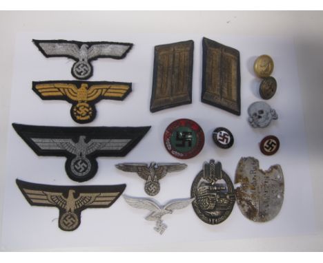 Germany,Badges and Insignia: an assortment to include tunic insignia, cap insignia, buttons, Armbands (3), assorted badges in