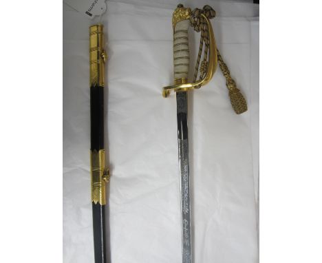 A G.VI.R. Royal Navy Officer's Sword,by Wilkinson Sword, unnumbered. In gilt metal and leather scabbard with sword knot. (1)F