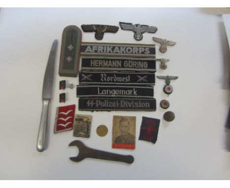 Assorted German WW2 Militaria,an assortment of cloth cuff titles, metal and cloth eagles for various uniforms, spanner stampe