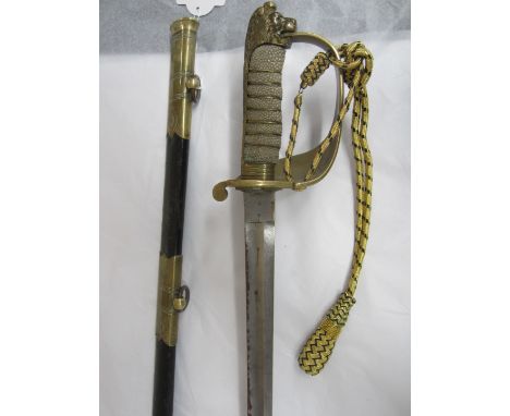 A Post 1902 Naval Officer's Sword,with slightly curved engraved blade, by J.Friedeberg 81 Queen's St Portsea. In leather and 