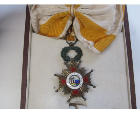 Spain,Order of Isabella the Catholic, First Class sash badge in silver-gilt and enamel. In Cejalvo case of issue. Some light 