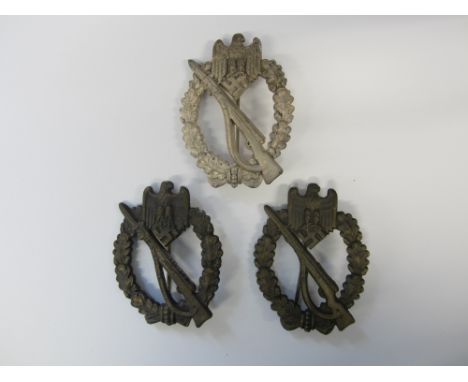 Germany,WW2 Infantry Assault badge, bronze (2), silver. Some very light zinc corrosion otherwise very fine. (3)For further in