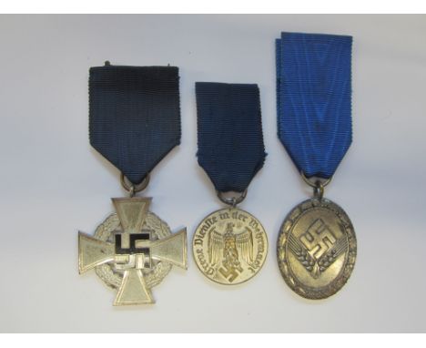 Germany,NSDAP long service medal for 25 years. RAD Long Service Medal for 12 years. Army Long Service medal for 4 years. Very