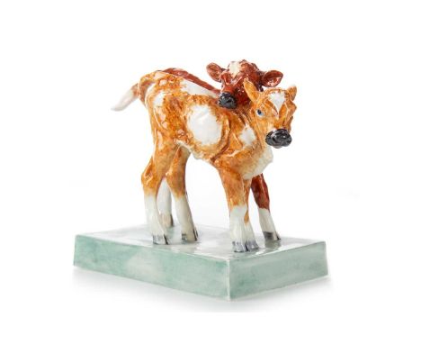 DORIS LINDNER FOR ROYAL WORCESTER, CALVES, stamped marks in green, on oblong base11.5cm wide Condition overall is good.