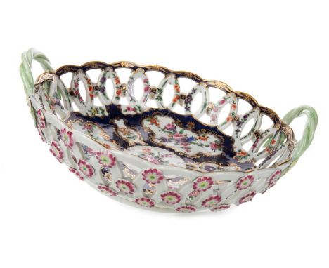 FIRST PERIOD WORCESTER PORCELAIN CIRCULAR BOWL, LATE 18TH CENTURY  with pierced lattice border and painted with floral reserv