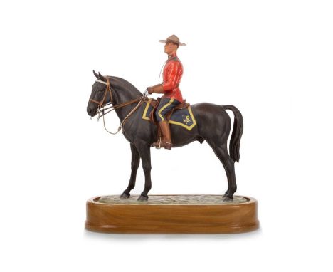 DORIS LINDNER FOR ROYAL WORCESTER, ROYAL CANADIAN MOUNTED POLICEMAN, CIRCA 1966 no. 320/500, stamped marks, on plinth, with c