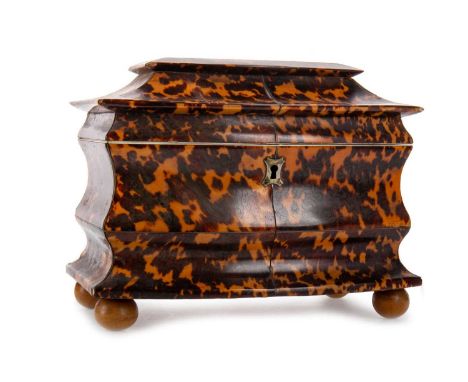 TORTOISESHELL TEA CADDY, EARLY / MID 19TH CENTURY   of shaped rectangular form, with pagoda top, the interior lined with ivor