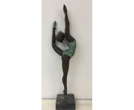 JONATHAN WYLDER. (1957-) A limited edition, patinated bronze figure of a ballerina on a marble base, signed to standing foot 