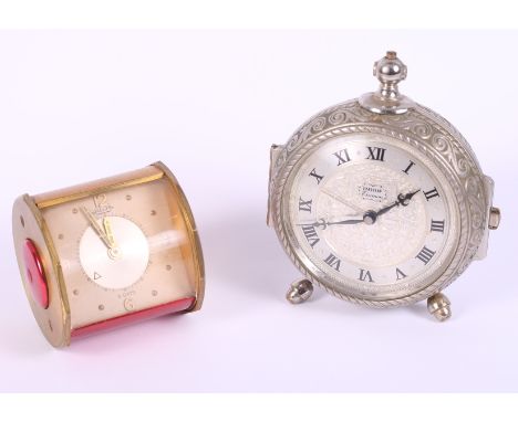 A Jaeger travelling alarm clock with eight-day movement and an Imhof Trianon travelling alarm clock formed as a pocket watch