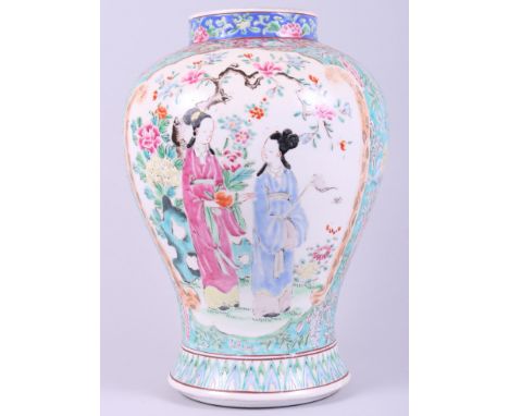 A 19th century Chinese porcelain polychrome enamel vase with figured panels, 10 1/2" high