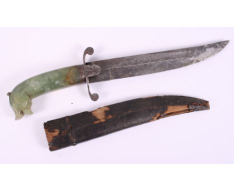 A 19th century Indian/Mughal dagger with carved jade handle, blade 9" long, in leather scabbard