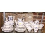 A 1960s Midwinter "Pierrot" pattern combination service for six, designed by Nigel Wilde,