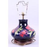 A Moorcroft "Anemone" pattern table lamp with shade, 8 3/4" high